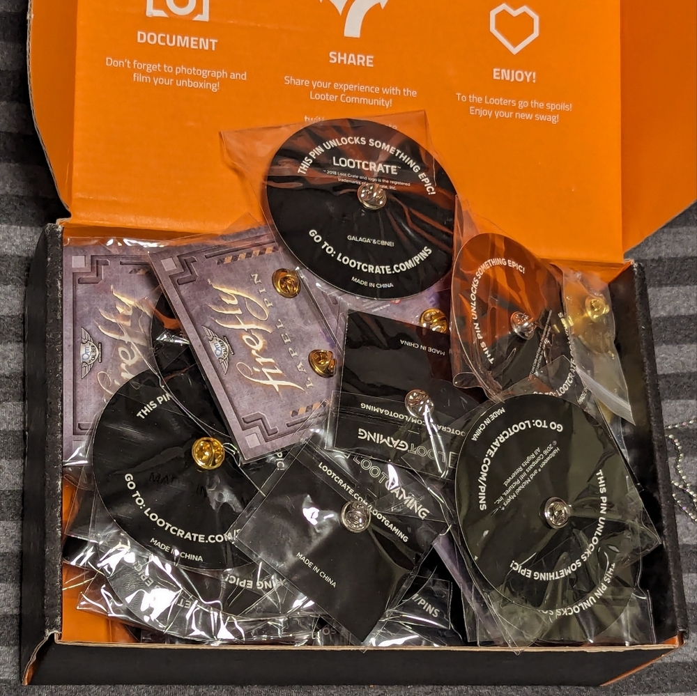 Box of mystery Lootcrate pins